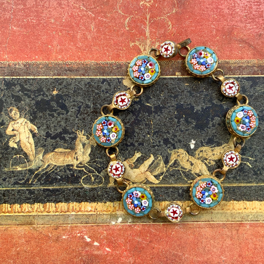 A bracelet featuring colorful floral and star-themed micro-mosaics. カラフルなお花と星のマイクロモザイク のブレスレット。