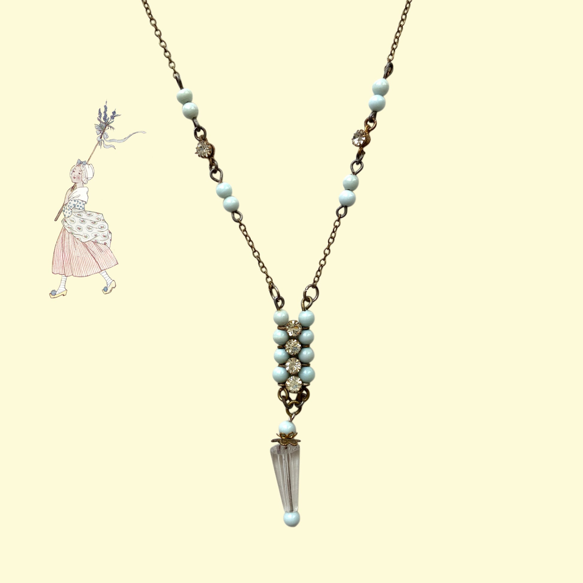 Art Deco vintage necklace featuring powder blue glass beads and rhinestones. パウダーブルーのグラスビーズとラインストーンを使用したアールデコのヴィンテージネックレス。
