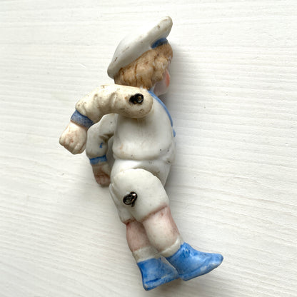 An antique bisque sailor boy doll from around the 1900s–20s. 1900〜20年代頃のセーラーボーイのアンティークビスクドール。 