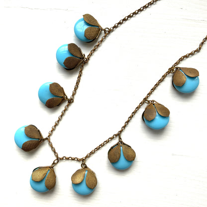 VINTAGE ART DECO Turquoise Flat Round Glass & Gold Tone Leaf Necklace