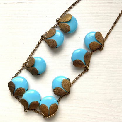 VINTAGE ART DECO Turquoise Flat Round Glass & Gold Tone Leaf Necklace