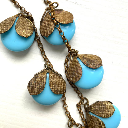 VINTAGE ART DECO Turquoise Flat Round Glass & Gold Tone Leaf Necklace