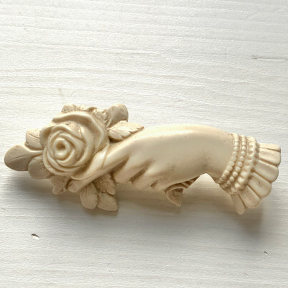 1980's White/ivory Plastic Hand & Rose Brooch