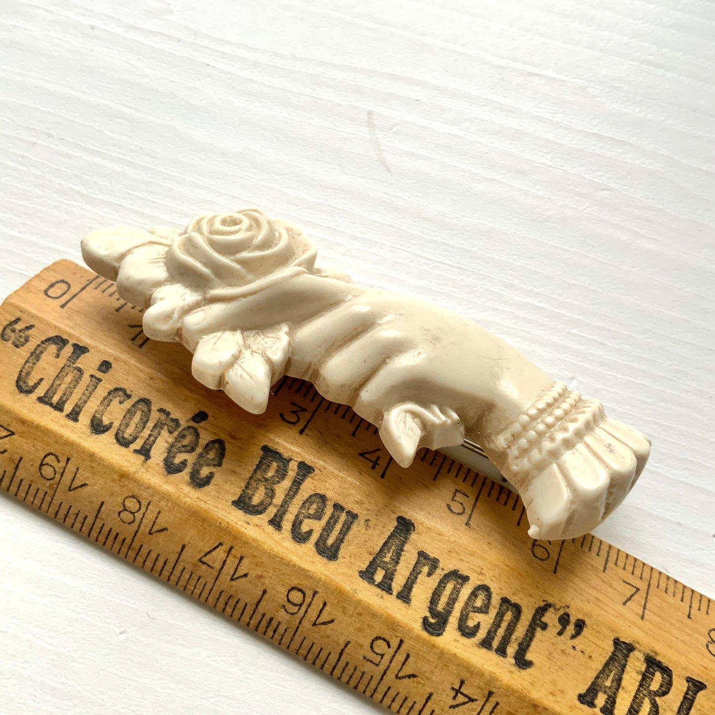 1980's White/ivory Plastic Hand & Rose Brooch