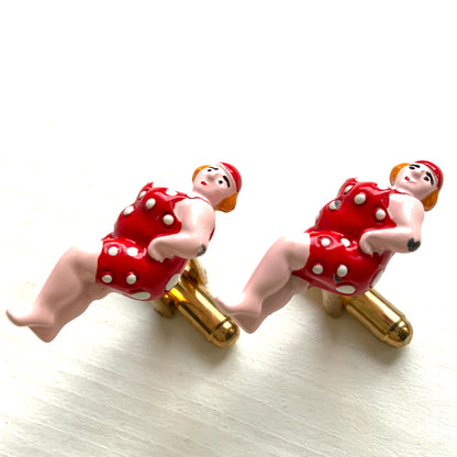 Vintage cufflinks featuring a charming lady in a polka dot swimsuit. 水玉模様の水着を着た女性がモチーフになった、ヴィンテージカフリンク。