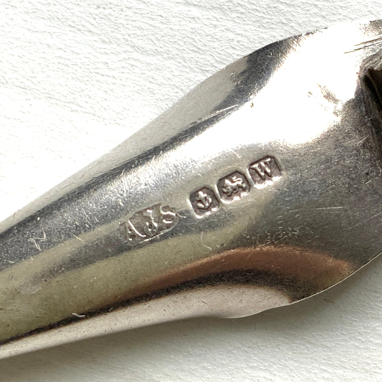 A silver lily of the valley mini brooch by AJS. AJSのシルバー製スズランモチーフのミニブローチ。 
