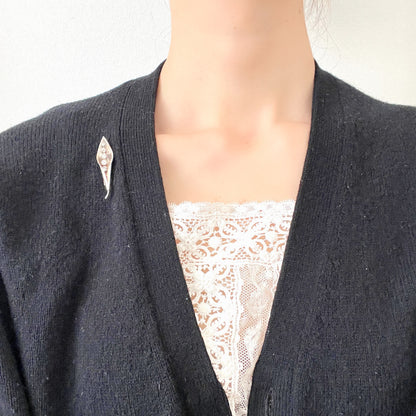 A silver lily of the valley mini brooch by AJS. AJSのシルバー製スズランモチーフのミニブローチ。 