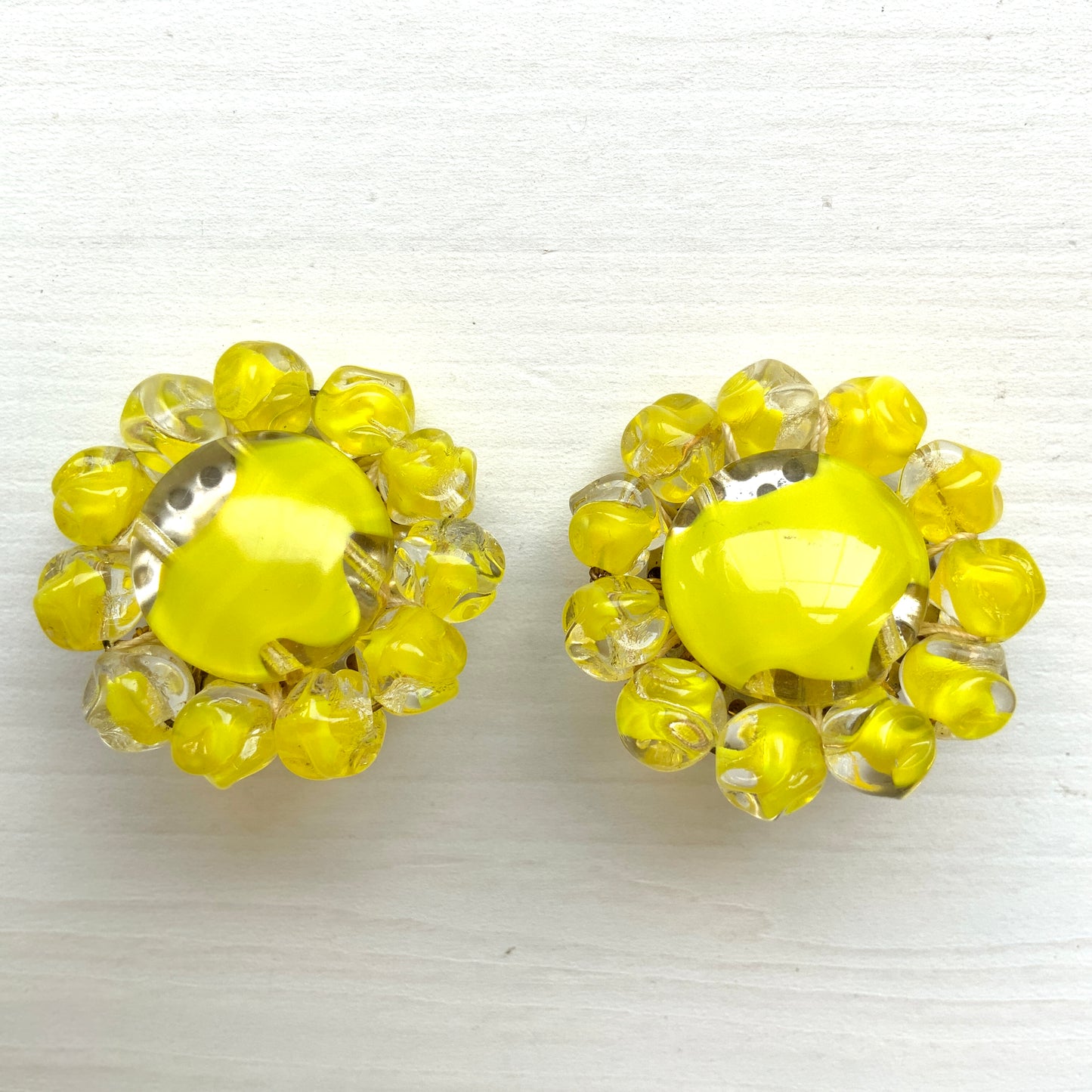 Vibrant neon yellow givre glass clip-on earrings. 鮮やかなネオンイエローのジーブルガラスのクリップイヤリング。 