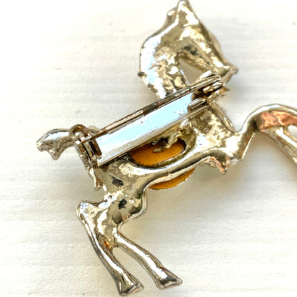 A mid-century horse motif brooch. ミッドセンチュリーの馬モチーフブローチ。