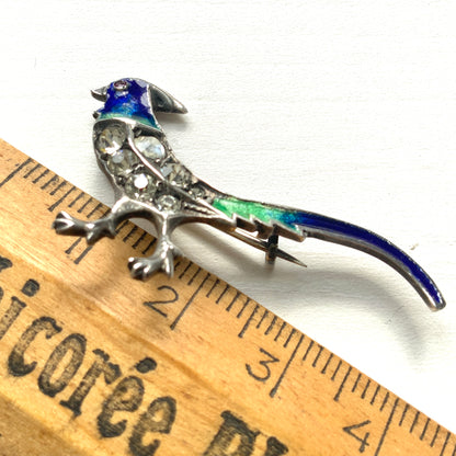 A sterling silver pheasant brooch featuring a beautiful enamel gradient shifting from blue to green.  ブルーからグリーンへと移ろうエナメルのグラデーションが美しい、雉モチーフのシルバーブローチ。