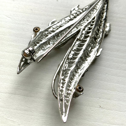 A lily of the valley brooch set with marcasite. マーカサイトがあしらわれたスズランモチーフのブローチ。 