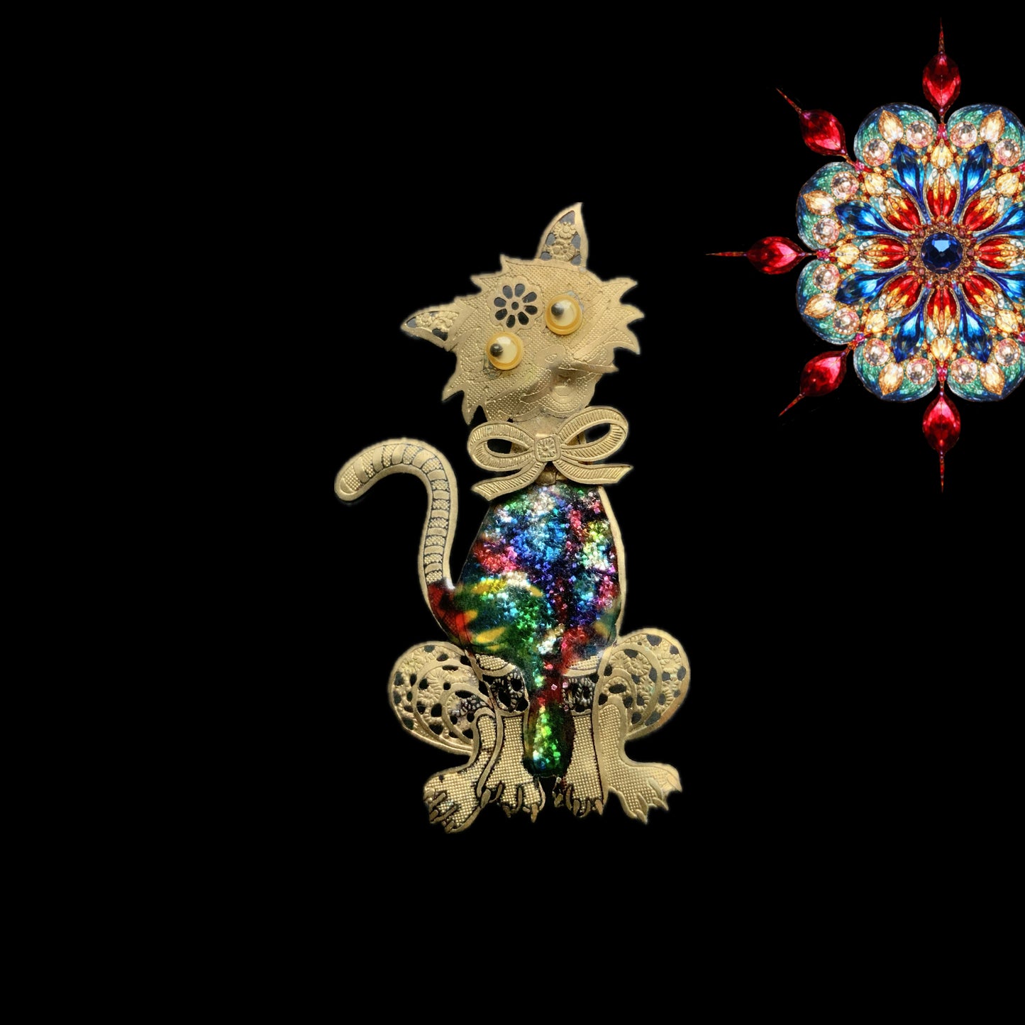 A vintage cat brooch featuring a vibrant rainbow enamel body. レインボーグリッターのボディが印象的な、ヴィンテージのキャットブローチ。