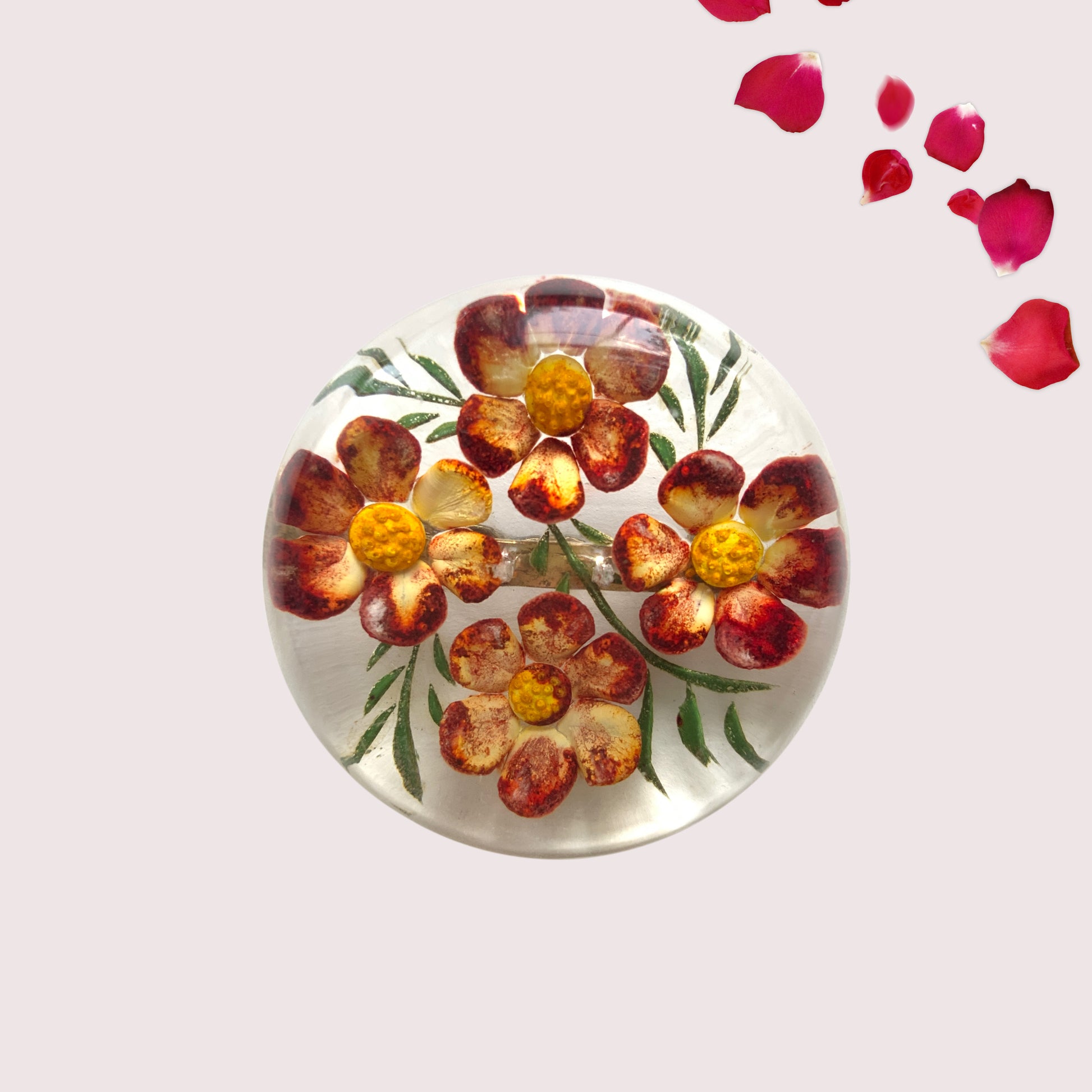 A charming 1950s reverse carved Lucite brooch featuring a vibrant red flower. 1950年代の赤いお花のインタリオブローチ。