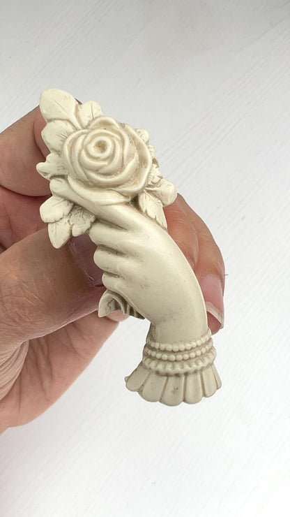 1980's White/ivory Plastic Hand & Rose Brooch